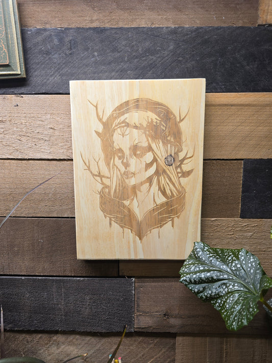 Wicket Forest Witch on wood plank